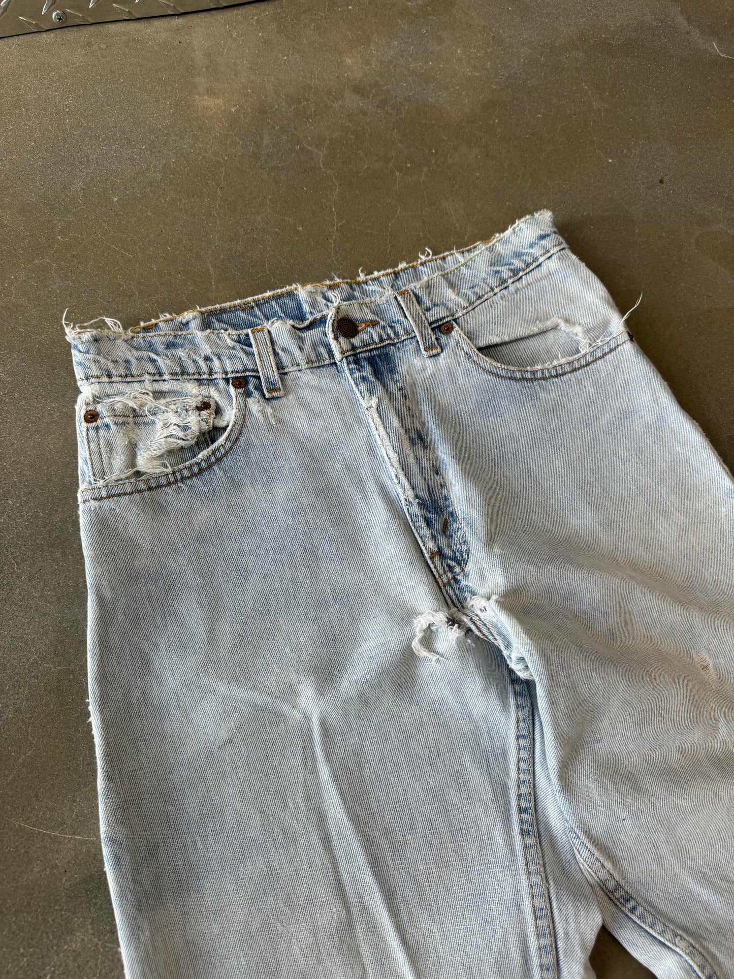 Vintage 1990s Distressed Thrashed Levis 550 Made in USA Denim Jeans [30]