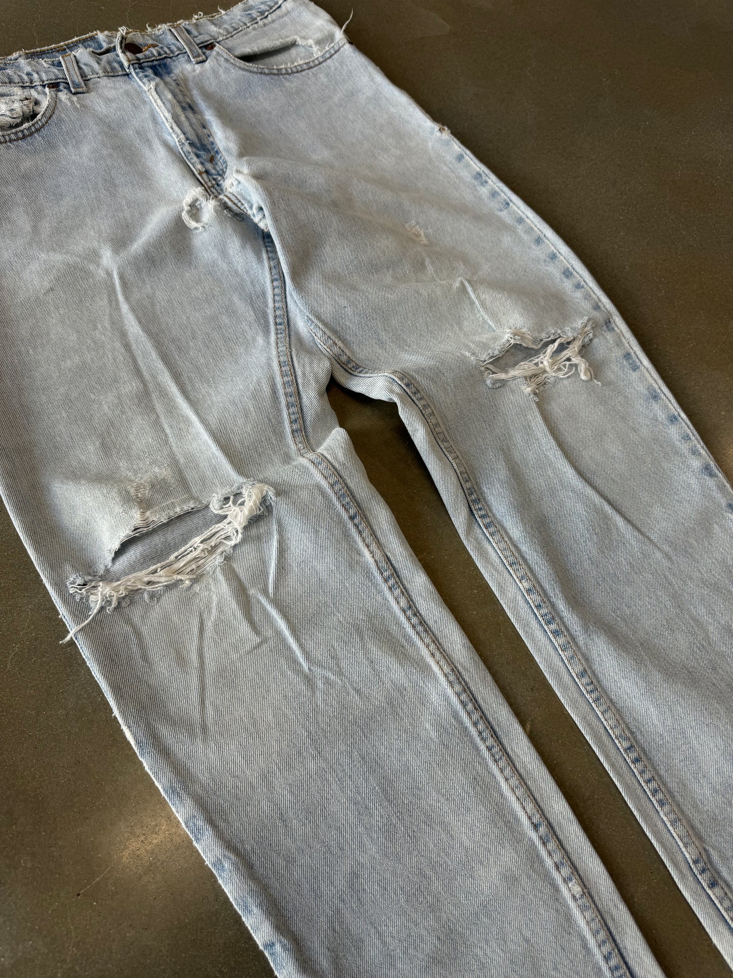 Vintage 1990s Distressed Thrashed Levis 550 Made in USA Denim Jeans [30]