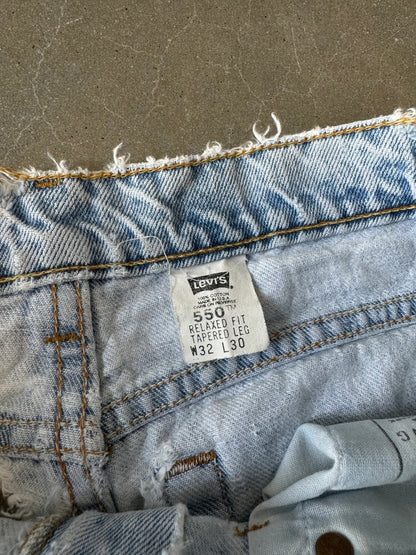 Vintage 1990s Distressed Thrashed Levis 550 Made in USA Denim Jeans [30]