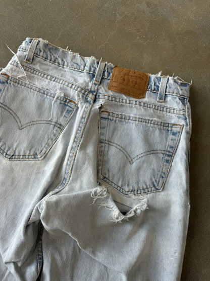 Vintage 1990s Distressed Thrashed Levis 550 Made in USA Denim Jeans [30]